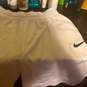 White Nike shorts